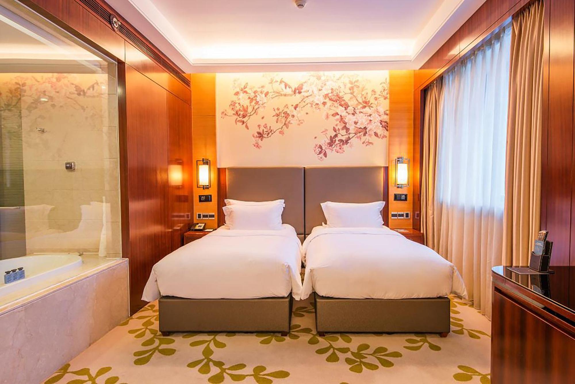 Enlux Hotel Csinan Kültér fotó